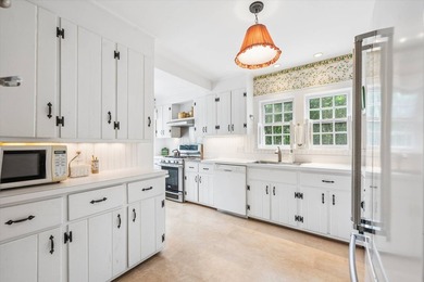 Tucked away on a desirable village street, this circa-1927 home - photo 7
