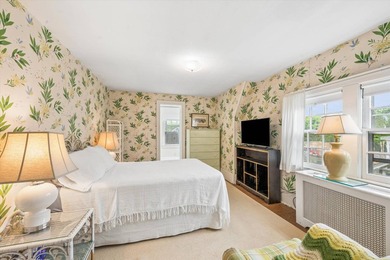 Tucked away on a desirable village street, this circa-1927 home - photo 10