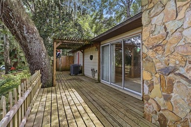 Nestled beneath a canopy of majestic oak trees and overlooking - photo 33