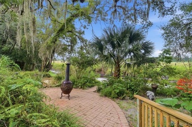 Nestled beneath a canopy of majestic oak trees and overlooking - photo 35
