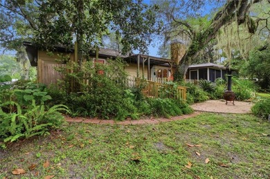 Nestled beneath a canopy of majestic oak trees and overlooking - photo 40