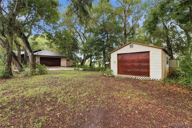 Nestled beneath a canopy of majestic oak trees and overlooking - photo 44