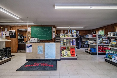 Exceptional opportunity to own a turnkey Marine Center ideally - photo 6