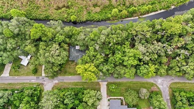 Nestled beneath a canopy of majestic oak trees and overlooking - photo 46
