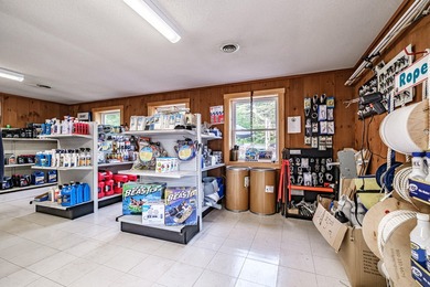 Exceptional opportunity to own a turnkey Marine Center ideally - photo 7