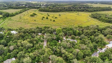Nestled beneath a canopy of majestic oak trees and overlooking - photo 47