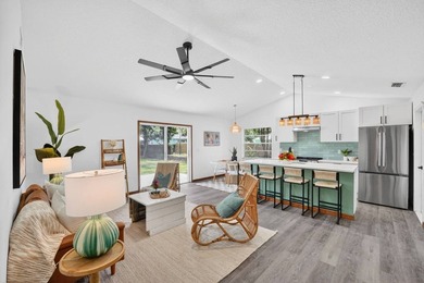 Now offered at $289,000, this beautifully updated 3BD/2BTH Palm - photo 3