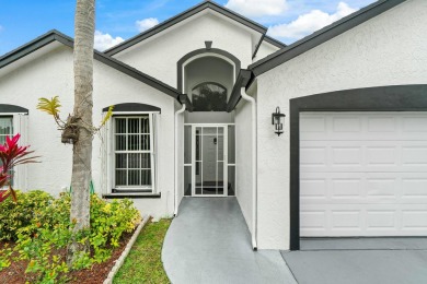 Lake Home For Sale in West Palm Beach, Florida