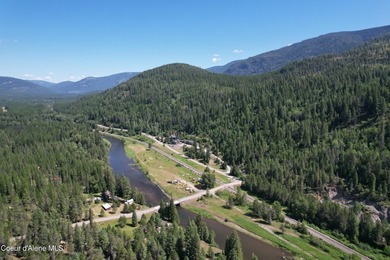 Escape to the rugged beauty of North Idaho with this exclusive - photo 2