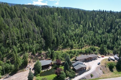 Escape to the rugged beauty of North Idaho with this exclusive - photo 7