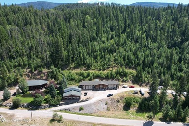 Escape to the rugged beauty of North Idaho with this exclusive - photo 9