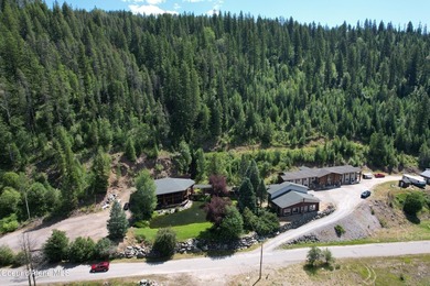 Escape to the rugged beauty of North Idaho with this exclusive - photo 10