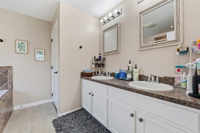 Located within the gated Riverview Townhomes community, this - photo 21