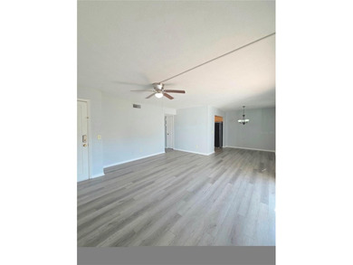 This waterfront ground-level 2-bedroom, 1-bath charmer comes - photo 2