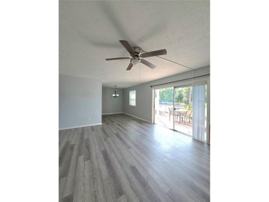 This waterfront ground-level 2-bedroom, 1-bath charmer comes - photo 4