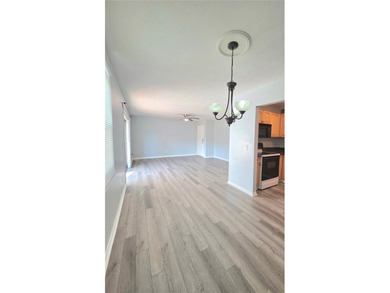 This waterfront ground-level 2-bedroom, 1-bath charmer comes - photo 5