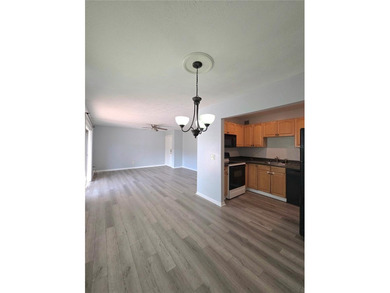 This waterfront ground-level 2-bedroom, 1-bath charmer comes - photo 6