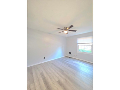 This waterfront ground-level 2-bedroom, 1-bath charmer comes - photo 8