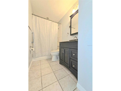 This waterfront ground-level 2-bedroom, 1-bath charmer comes - photo 10