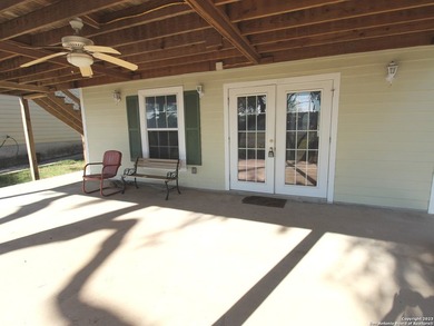 Nestled along the serene shores of Medina Lake, this charming - photo 22