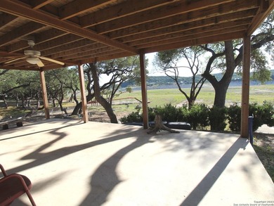 Nestled along the serene shores of Medina Lake, this charming - photo 24