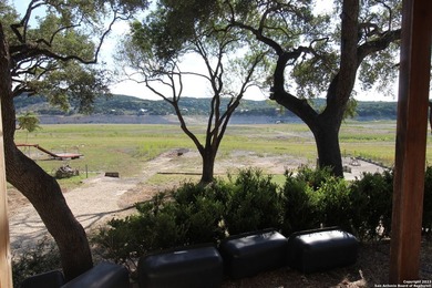 Nestled along the serene shores of Medina Lake, this charming - photo 25