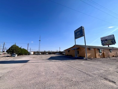 This Budget Inn has 17 bedrooms ready to for the next traveler