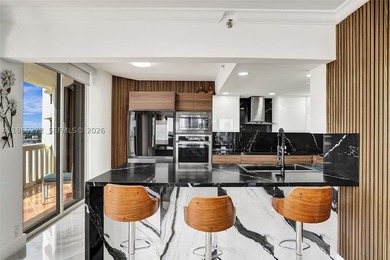 SPECTACULAR VIEWS TO THE INTRACOASTAL AND OCEAN FROM THIS BRIGHT - photo 2
