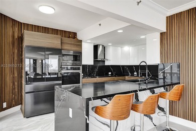SPECTACULAR VIEWS TO THE INTRACOASTAL AND OCEAN FROM THIS BRIGHT - photo 3
