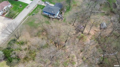 This inviting and spacious lot in Lake Camelot Section 6 offers - photo 10