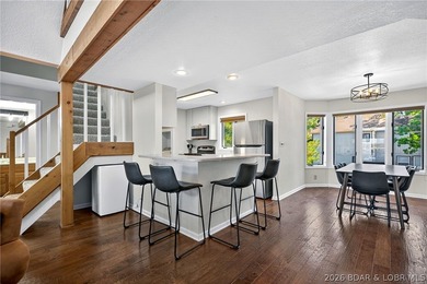 Top-floor living at Summerset Condominiums blends thoughtful - photo 11