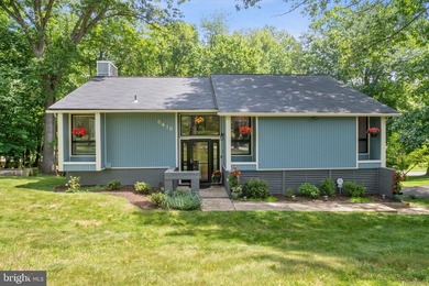 Beautiful, custom-built split foyer home situated on over an - photo 1