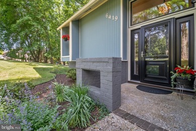 Beautiful, custom-built split foyer home situated on over an - photo 3