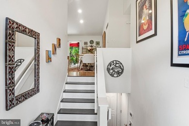 Beautiful, custom-built split foyer home situated on over an - photo 4