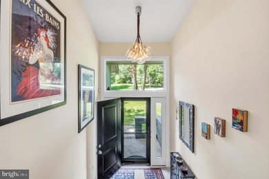 Beautiful, custom-built split foyer home situated on over an - photo 5