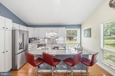 Beautiful, custom-built split foyer home situated on over an - photo 7