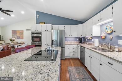 Beautiful, custom-built split foyer home situated on over an - photo 8