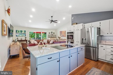 Beautiful, custom-built split foyer home situated on over an - photo 10