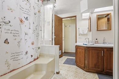 Meticulously maintained 2-bedroom, 1.5-bath waterfront home on - photo 11