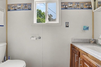 Meticulously maintained 2-bedroom, 1.5-bath waterfront home on - photo 14