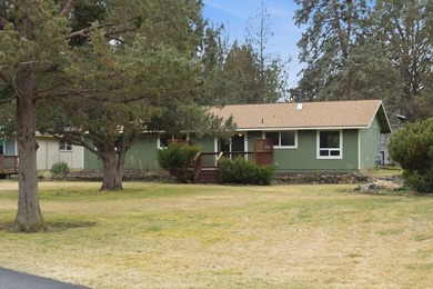 A well-kept single-level 4-bedroom, 2-bath, 1456 Sq. Ft. home in