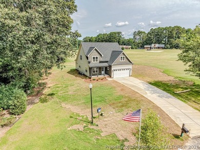 Welcome to luxury living in the prestigious gated community of - photo 1