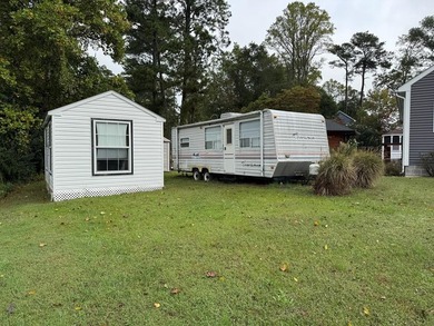 Lot with septic, camper, and room with a peek a boo view of the - photo 1