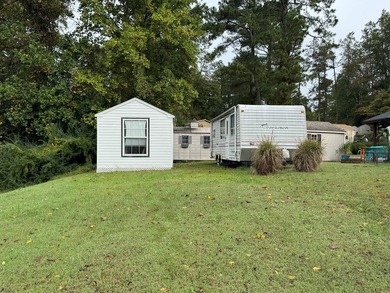 Lot with septic, camper, and room with a peek a boo view of the - photo 8