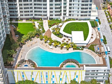 Perched on the 15th floor, this brand-new waterfront residence - photo 5