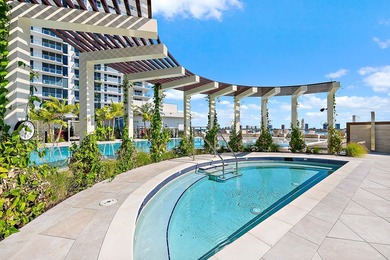 Perched on the 15th floor, this brand-new waterfront residence - photo 6