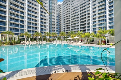 Perched on the 15th floor, this brand-new waterfront residence - photo 8