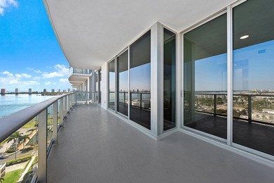 Perched on the 15th floor, this brand-new waterfront residence - photo 9