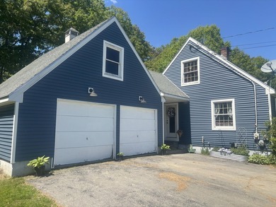 Nestled in a peaceful, private setting, this charming home - photo 1