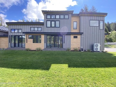 New Lakefront Quality Custom built home sitting at Lake Level on - photo 3